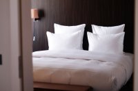 Zo stylet je je bed als een boetiekhotel